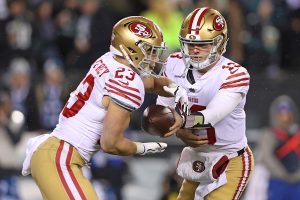 January 29, 2023 ~ San Francisco 49ers quarterback Brock Purdy hands off to running back Christian McCaffrey against the Philadelphia Eagles during the fourth quarter in the NFC Championship game at Lincoln Financial Field. Photo: Bill Streicher ~ USA TODAY Sports