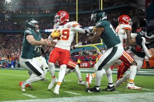 February 12, 2023 ~ Kansas City Chiefs wide receiver Kadarius Toney is tackled by Philadelphia Eagles linebacker Nakobe Dean and punter Arryn Siposs on a punt return during the fourth quarter in Super Bowl LVII at State Farm Stadium. Photo: Michael Chow ~ USA TODAY SPORTS