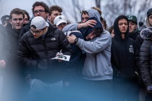 February 15, 2023 ~ The Spartan community gathers on the Campus of Michigan State University for a vigil honoring the victims of the March 13 shootings which killed three and seriously wounded five. Photo: Ryan Garza ~ USA TODAY NETWORK