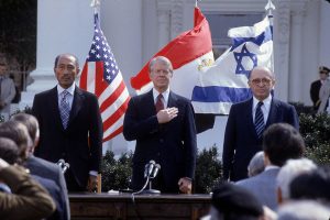 March 1, 1979 ~ President Jimmy Carter with Egyptian President Anwar Sadat and Israeli leader Menachem Begin at a Middle East peace treaty signing ceremony at the White House in Washington D.C. Photo: Dirck Halstead ~ Getty Images