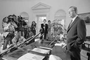 April 1, 1980 ~ President Carter speaks to reporters in the Oval Office of the White House to give an update on the Iranian hostage crisis. Carter told reporters that the decision of the Iranian government to take custody of the American hostages is, "A possitive step," and "We do not intend to impose additional sanctions against Iran." Photo: Bettmann ~ Getty Images
