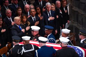 December 5, 2018 ~ President Donald Trump and First Lady Melania Trump with former President Barack Obama and Michelle Obama, former President Bill Clinton and former Secretary of State Hillary Clinton, and former President Jimmy Carter and Rosalynn Carter place their hands to heart at conclusion of the state funeral for former President George H.W. Bush at the Washington National Cathedral. Photo: USA TODAY NETWORK