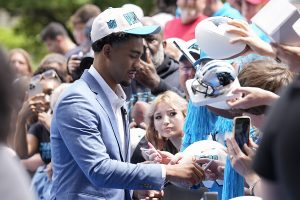 April 28, 2023 ~ NFL Draft first round overall pick Bryce Young signs autographs for Carolina Panthers fans at Bank of America Stadium in Charlotte, North Carolina. Photo: Jim Dedmon ~ USA TODAY NETWORK