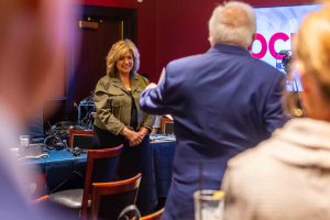 WJR Senior News Analyst Marie Osborne talks to Paul W. Smith at the launch of his new show "Focus" on June 20, 2023.