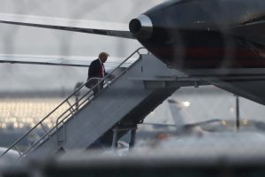 Aug 24, 2023; Atlanta, GA, USA; Former U.S. President Donald Trump departs Hartsfield Jackson International Airport after turning himself in at the Fulton County jail in Atlanta, GA. A grand jury in Fulton County, Georgia indicted former president Donald Trump and 18 other defendants with 41 charges related to tampering with the 2020 election. All defendants have been ordered to turn themselves in by August 25. Photo: Joshua Jones ~ USA TODAY NETWORK