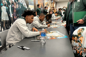 October 16, 2023 ~ Michigan State University players greet fans and sign autographs at the university’s annual Midnight Madness basketball season kick-off event at the Breslin Center in East Lansing. Photo: Dominic Carroll ~ WJR