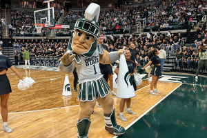 October 16, 2023 ~ Michigan State University’s cheer squad and university mascot, Sparty entertain fans at the university’s annual Midnight Madness basketball season kick-off event at the Breslin Center in East Lansing. Photo: Dominic Carroll ~ WJR