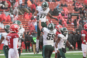 Oct. 14, 2023 ~ Michigan State Spartans wide receiver Tre Mosley (17) celebrates a touchdown reception with center Nick Samac (59) during the second half against the Rutgers. Photo: Vincent Carchietta ~ USA TODAY Sports