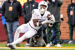 Oct. 28, 2023 ~ Michigan State Spartans wide receiver Jaron Glover (15) catches a pass against the Minnesota Golden Gophers during the fourth quarter at Huntington Bank Stadium. Photo: Nick Wosika ~ USA TODAY Sports