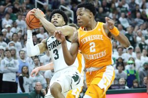 Oct. 29, 2023 ~ Michigan State Spartans guard Jaden Akins drives against Tennessee Volunteers guard Jordan Gainey during second-half action at Breslin Center in East Lansing. Photo: Kirthmon F. Dozier ~ USA TODAY NETWORK