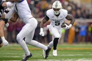 Oct. 28, 2023 ~ Michigan State running back Nate Carter runs with the ball against the Minnesota Golden Gophers during the first quarter at Huntington Bank Stadium. Photo: Nick Wosika ~ USA TODAY Sports