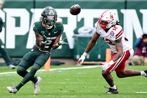 Nov. 4, 2023 ~ Michigan State Spartans wide receiver Tyrell Henry (2) pulls in a pass in the third quarter against Nebraska Cornhuskers defensive back Omar Brown (12) at Spartan Stadium. Photo: Dale Young ~ USA TODAY Sports