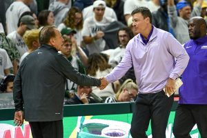 Nov. 6, 2023 ~ Michigan State Head Coach Tom Izzo shakes hands with James Madison Head Coach Mark Byington after the Spartans’ 79-76 loss at the Breslin Center in East Lansing. Photo: Nick King ~ USA TODAY NETWORK