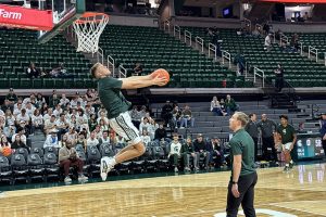 Nov. 6, 2023 ~ Members of the Michigan State Spartans basketball team warm up ahead of their game against James Madison at the Breslin center in East Lansing. Photo: Dominic Carroll ~ WJR