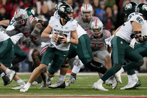 Nov. 11, 2023 ~ Michigan State Spartans quarterback Katin Houser (12) looks for a pass during the NCAA football game against Michigan State University at Ohio Stadium. Photo: Brooke LaValley ~ USA TODAY NETWORK