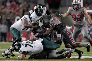 Nov. 11, 2023 ~ Michigan State Spartans tight end Maliq Carr (6) is tackled by Ohio State Buckeyes cornerback Calvin Simpson-Hunt (15) and Ohio State Buckeyes linebacker C.J. Hicks (11) during Saturday's NCAA Division I football game at Ohio Stadium. Photo: Barbara J. Perenic ~ USA TODAY NETWORK