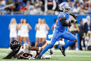 Nov. 19, 2023 ~ Detroit Lions running back Jahmyr Gibbs (26) runs against Chicago Bears linebacker Tremaine Edmunds (49) during the second half at Ford Field Photo: Junfu Han ~ USA TODAY NETWORK