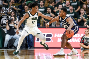 Nov. 17, 2023 ~ Michigan State's A.J. Hoggard, left, guards Butler's Pierre Brooks II during the second half in East Lansing. Photo: Nick King ~ USA TODAY NETWORK