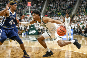 Nov. 17, 2023 ~ Michigan State's Jaden Akins, right, moves the ball as Butler's DJ Davis defends during the first half in East Lansing. Photo: Nick King ~ USA TODAY NETWORK