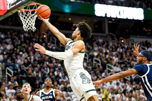Nov. 17, 2023 ~ Michigan State's Malik Hall scores against Butler during the second half in East Lansing. Photo: Nick King ~ USA TODAY NETWORK