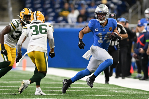 Nov. 23, 2023 ~ Detroit Lions wide receiver Amon-Ra St. Brown (14) runs up field after catching a pass against the Green Bay Packers in the fourth quarter at Ford Field. Photo: Lon Horwedel ~ USA TODAY Sports