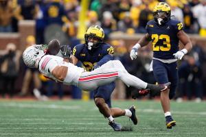 Nov. 25, 2023 ~ Michigan Wolverines defensive back Quinten Johnson (28) hits Ohio State Buckeyes wide receiver Emeka Egbuka (2) forcing an incomplete pass during the second half of the NCAA football game at Michigan Stadium. Photo: Adam Cairns ~ USA TODAY NETWORK