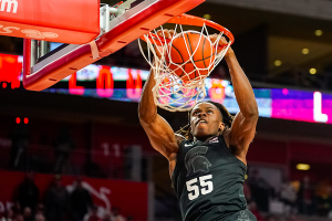 Dec. 10, 2023 ~ Michigan State Spartans forward Coen Carr (55) dunks the ball against the Nebraska Cornhuskers during the second half at Pinnacle Bank Arena. Photo: Dylan Widger ~ USA TODAY Sports