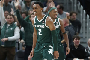 Dec. 16, 2023 ~ Michigan State guard Tyson Walker reacts after hitting a 3-pointer during the second half of MSU's 88-64 win over Baylor at Little Caesars Arena. Photo: Kirthmon F. Dozier ~ USA TODAY NETWORK