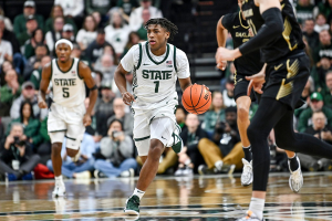 Dec. 18, 2023 ~ Michigan State's Jeremy Fears Jr. moves the ball against Oakland during the first half at the Breslin Center in East Lansing. Photo: Nick King ~ USA TODAY NETWORK