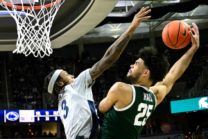 Jan. 4, 2024 ~ Michigan State Spartans forward Malik Hall (25) slams the ball home against Penn State Nittany Lions guard Nick Kern Jr. (3) during the second half at Jack Breslin Student Events Center. Photo: Dale Young ~ USA TODAY Sports