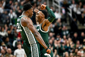 Jan. 4, 2024 ~ Michigan State‘s Mady Sissoko celebrates with Tyson Walker after Sissoko scored and was fouled by Penn State during the first half in East Lansing. Photo: Nick King ~ USA TODAY NETWORK