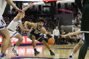 Jan. 7, 2024 ~ Northwestern Wildcats guard Brooks Barnhizer (13) defends Michigan State Spartans forward Malik Hall (25) during the first half at Welsh-Ryan Arena. Photo: David Banks ~ USA TODAY Sports