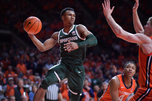 Jan. 11, 2024 ~ Michigan State Spartans guard Tyson Walker looks to pass as Illinois Fighting Illini guard Marcus Domask defends during the second half at State Farm Center. Photo: Ron Johnson ~ USA TODAY Sports