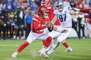 Sept. 7, 2023 ~ Detroit Lions defensive end Aidan Hutchinson looks to tackle Kansas City Chiefs quarterback Patrick Mahomes during the second half at Arrowhead Stadium in Kansas City. The Lions went on to defeat the chiefs 21-20.