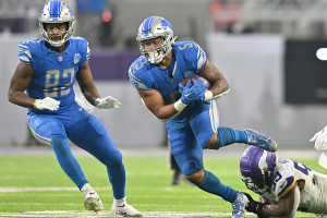 Dec. 24, 2023 ~ Detroit Lions running back David Montgomery (5) runs the ball as tight end James Mitchell (82) blocks against the Minnesota Vikings during the second quarter at U.S. Bank Stadium. Photo: Jeffrey Becker ~ USA TODAY Sports