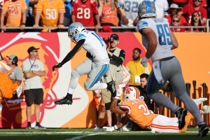 Oct. 15, 2023 ~ Detroit Lions wide receiver Amon-Ra St. Brown (14) runs the ball for a touchdown against the Tampa Bay Buccaneers during the first half at Raymond James Stadium. Photo: Kim Klement Neitzel ~ USA TODAY Sports