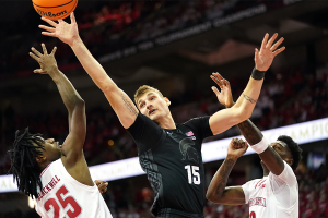 Jan 26, 2024 ~ Michigan State Spartans center Carson Cooper reaches for a rebound against Wisconsin Badgers guard John Blackwell and Wisconsin Badgers guard AJ Storr during the first half at the Kohl Center. Photo: Kayla Wolf ~ USA TODAY Sports