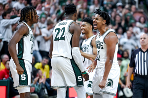 Feb. 3, 2024 ~ Michigan State's A.J. Hoggard, right, celebrates with teammates after scoring against Maryland in the second half at the Breslin Center in East Lansing. Photo: Nick King ~ USA TODAY NETWORK