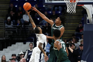 Feb 14, 2024 ~ Michigan State Spartans guard AJ Hoggard blocks a shot attempted by Penn State Nittany Lions guard Nick Kern Jr during the second half at Bryce Jordan Center. Michigan State defeated Penn State 80-72. Photo: Matthew O’Haren ~ USA TODAY Sports