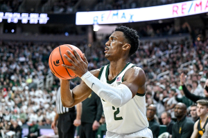 Feb 20, 2024 ~ Michigan State's Tyson Walker makes a three-pointer against Iowa during the first half at the Breslin Center in East Lansing. Photo: Nick King ~ USA TODAY NETWORK