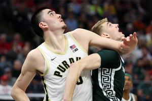 Mar 15, 2024 ~ Purdue Boilermakers center Zach Edey (15) and Michigan State Spartans center Carson Cooper (15) compete for position during the first half at Target Center. Photo: Matt Krohn ~ USA TODAY Sports