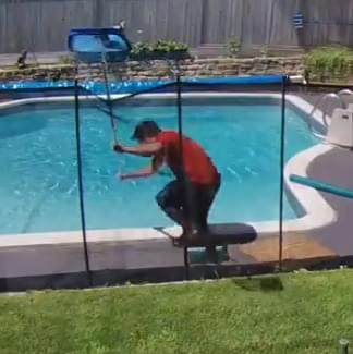 Would You React The Same?  Dead squirrel falls on guy…guy loses it!