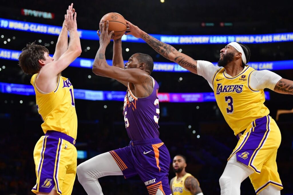 4th-quarter surge lifts Lakers past short-handed Suns