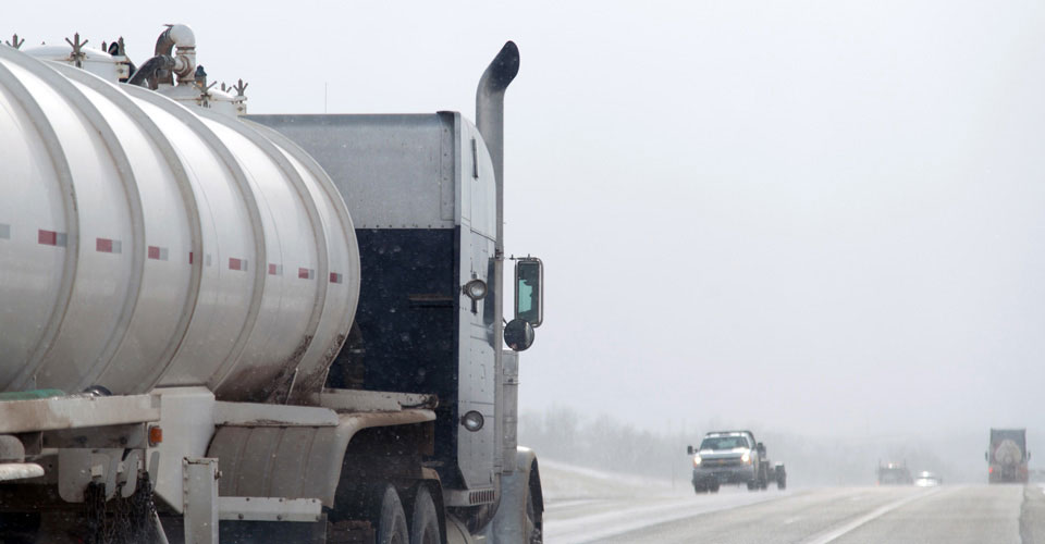 Trucks driving in the snow