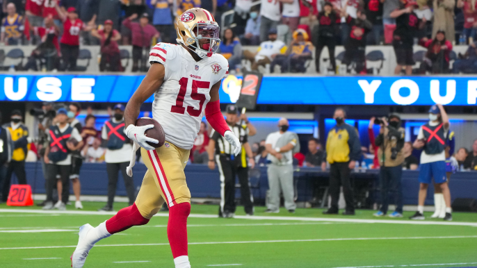 After harrowing first half, 49ers storm back to clinch playoff berth with sixth-straight win over Rams