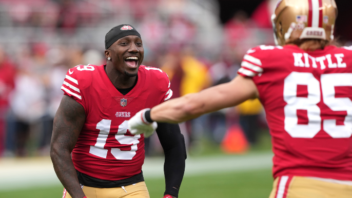 49ers rumble over threadbare Cardinals, enter playoffs on 10-game win streak