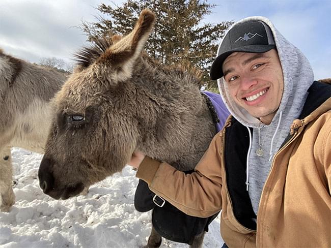 Tim and one of his pet donkeys