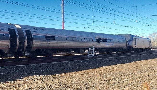 2 Amtrak construction workers killed when Amtrak train strikes backhoe