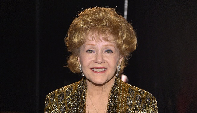 Debbie Reynolds, one of Hollywood's biggest stars in the 1950s and 1960s, passes away at age 84 on December 28, 2016. Reynolds died the day after her daughter actress Carrie Fisher passed away.