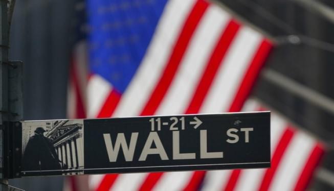 Wall Street hits records amid profit reports, inauguration